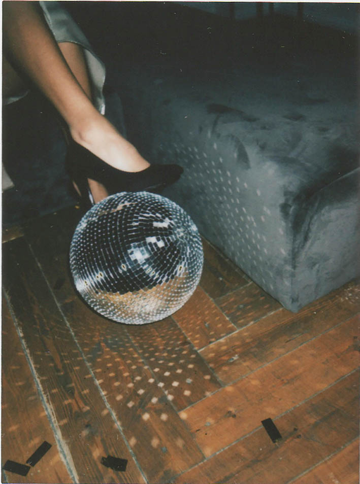 Integrate a metallic blue glam disco ball into your decor