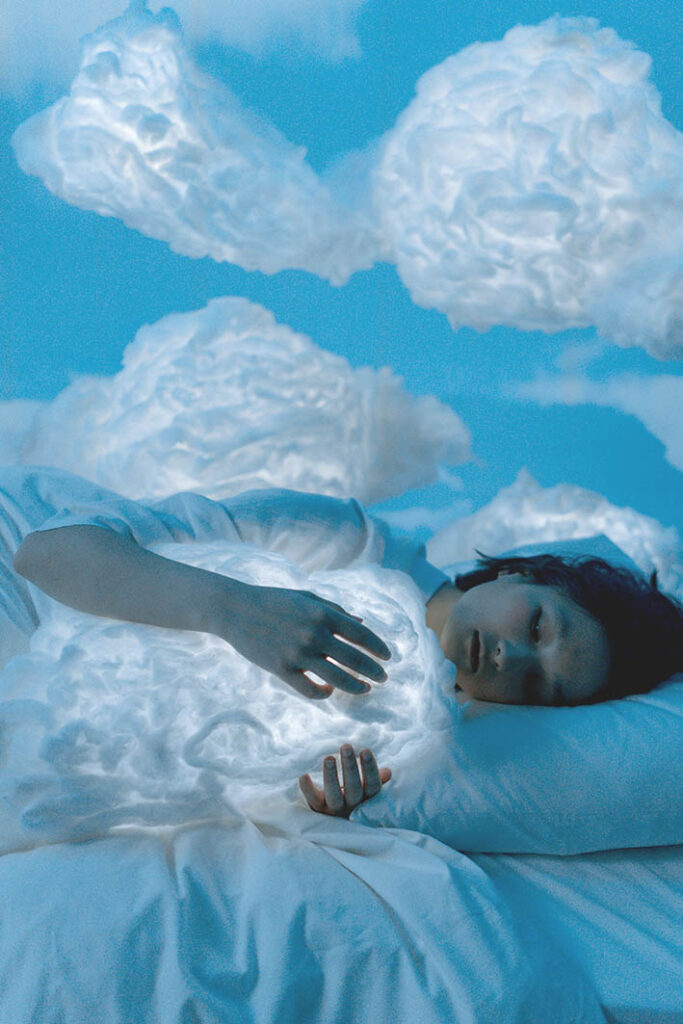 Sleep like an angel in a blue color palette with cloudlike lamps